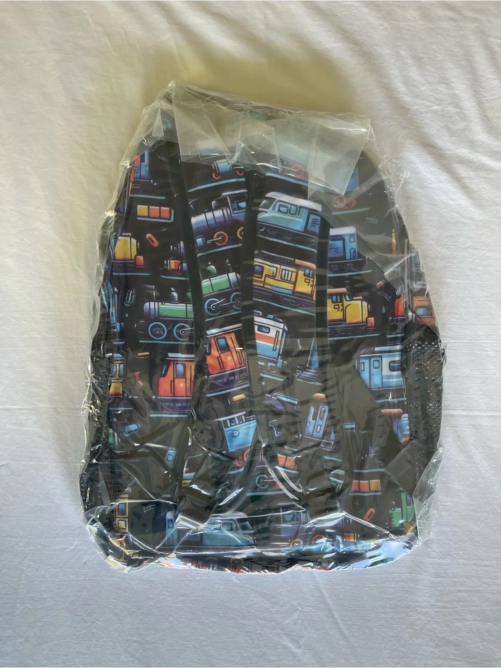 Kids Black Train-Print Backpack - Colorful Locomotive Design